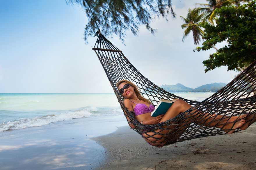 young attractive sexy woman in hammock on the beach